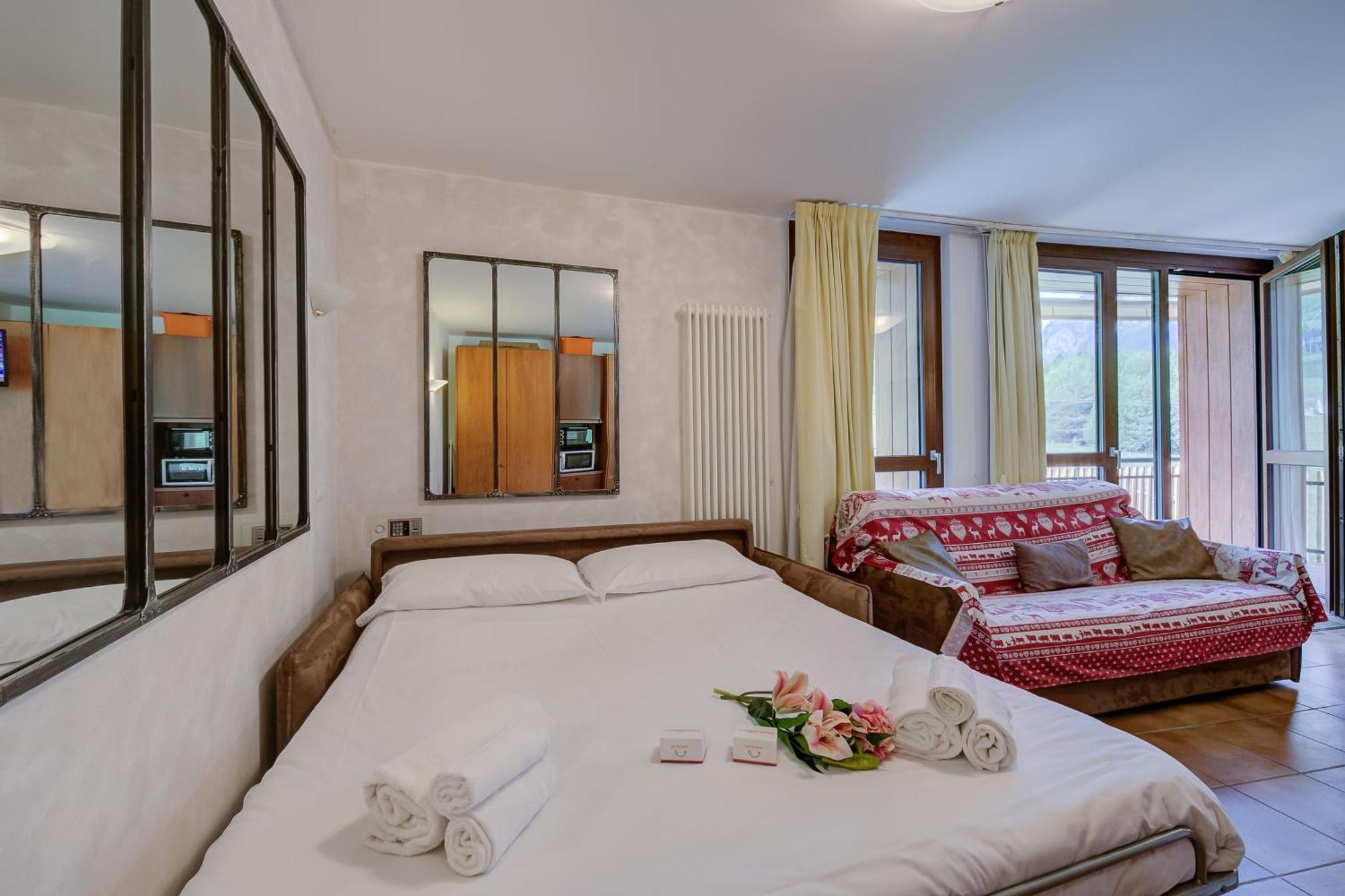 La Marmotta Campo Smith On The Ski Slopes - Happy Rentals บาร์โดเนกเกีย ภายนอก รูปภาพ
