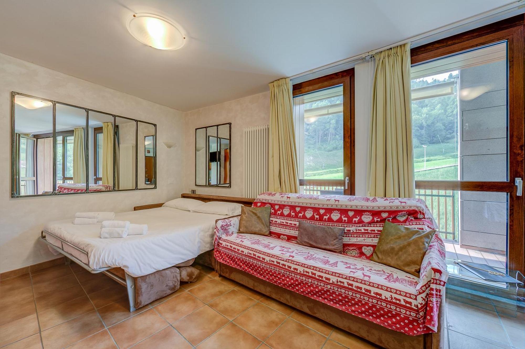 La Marmotta Campo Smith On The Ski Slopes - Happy Rentals บาร์โดเนกเกีย ภายนอก รูปภาพ